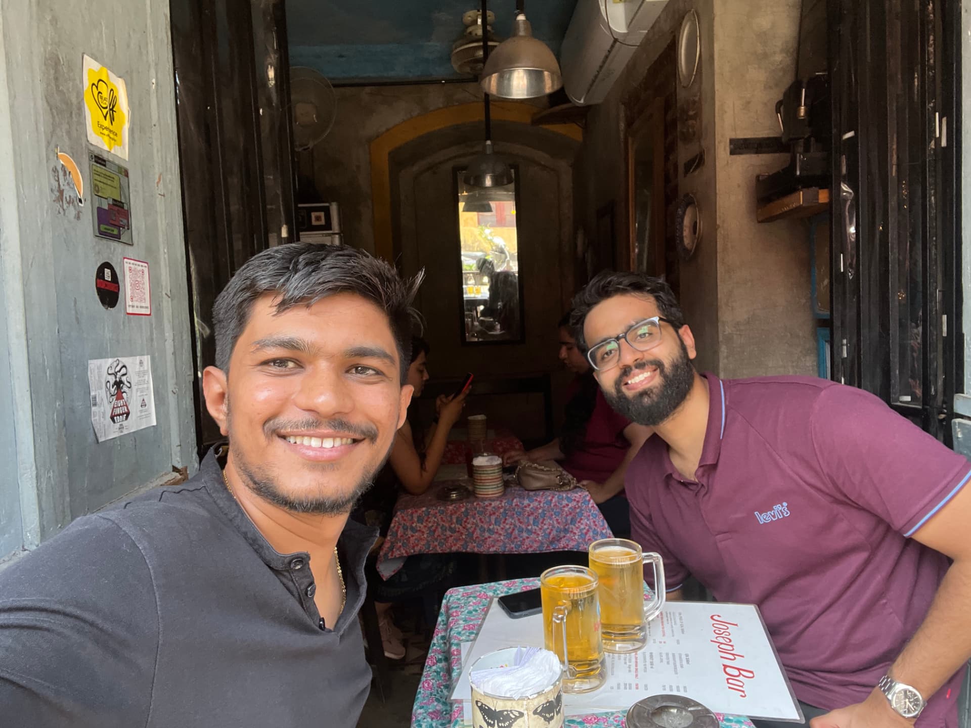Abhishek and Jeet, co-founders of Steinn AI Labs, sitting together at a table
